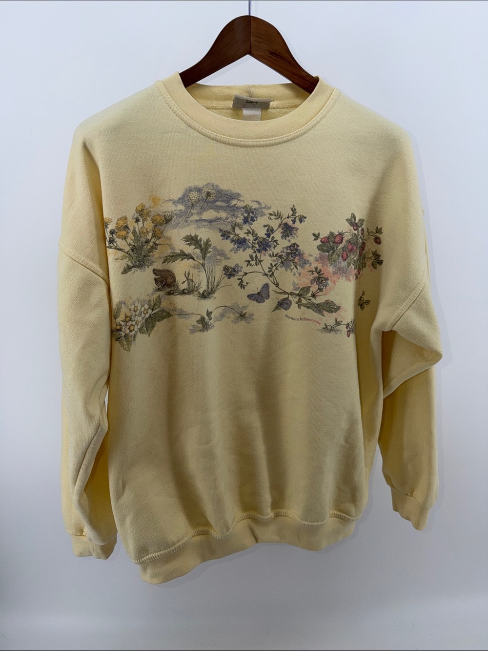 Northern Reflections Pale Yellow Crewneck Sweatshirt with Botanical Print